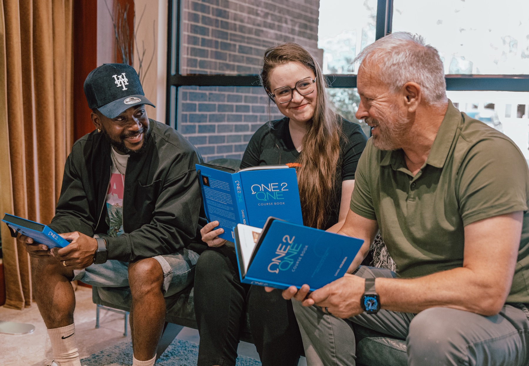Participants studying the One2One material together